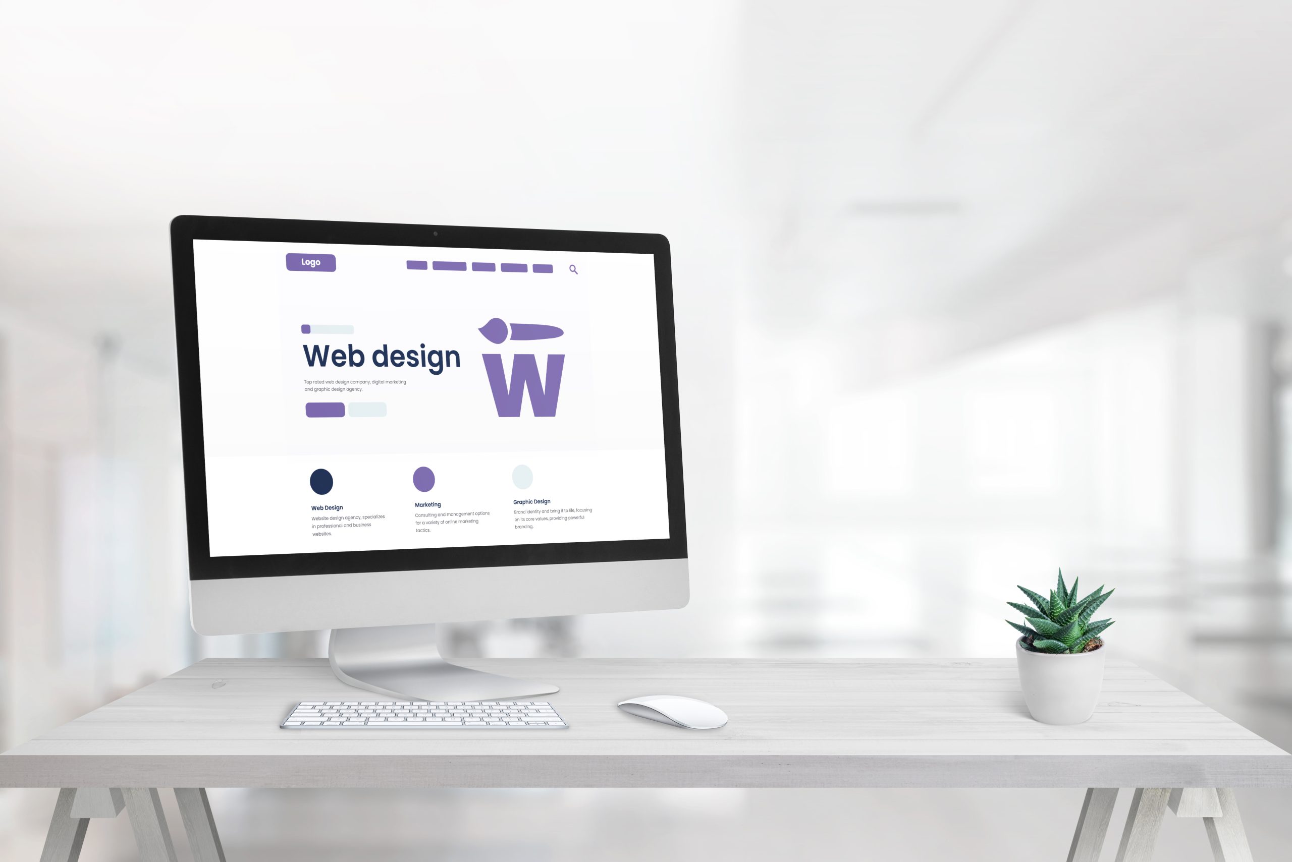 Web design studio with promo page on computer display and copy space beside Web design studio with promo page on computer display and copy space beside